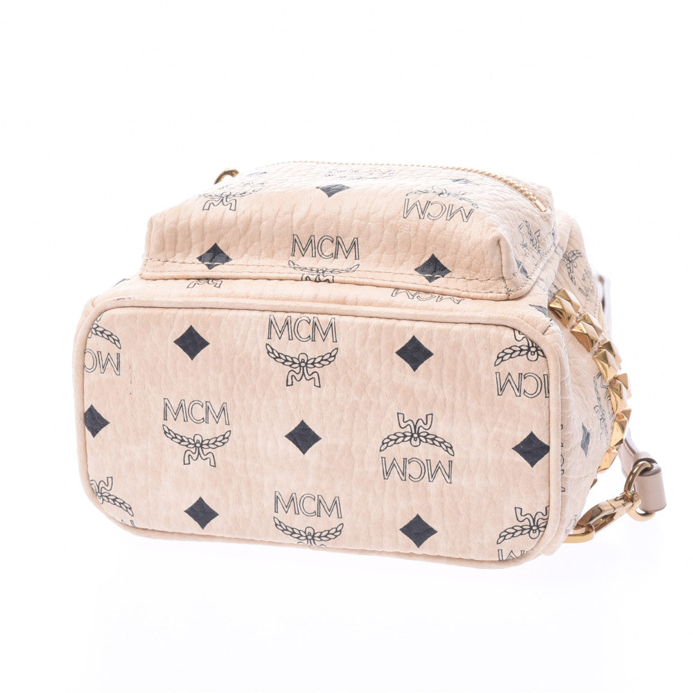 MCM レザーキャディバッグ ベージュ エムシーエムバックパックミニ サイドスタッズ ベージュ/ゴールド