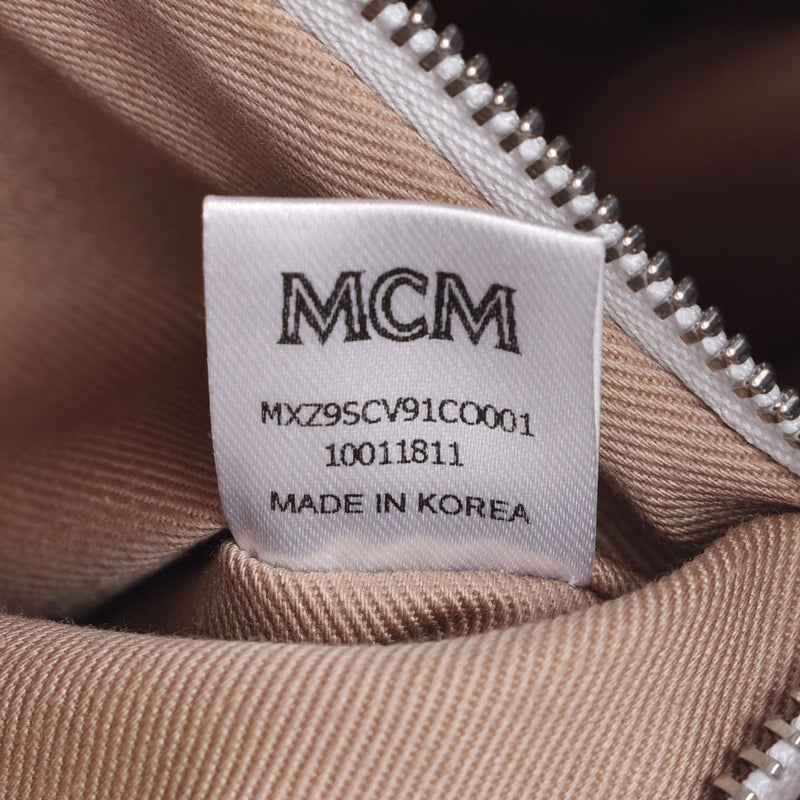 MCM M.M. 三色黑色/白色/棕色中性皮革离合器袋 A 级二手银藏