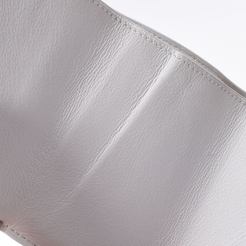 BALENCIAGA Balenciaga embossed compact wallet white 640107 Unisex calf three -fold wallet B rank used Ginzo