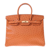 爱马仕爱马仕（Hermes Hermes Birkin）35橙色金支架□h雕刻（2004年左右）中性鸵鸟手袋均使用了Ginzo