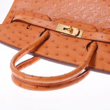 爱马仕爱马仕（Hermes Hermes Birkin）35橙色金支架□h雕刻（2004年左右）中性鸵鸟手袋均使用了Ginzo