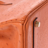 爱马仕爱马仕（Hermes Hermes Birkin）35橙色金支架□h雕刻（2004年左右）中性鸵鸟手袋均使用了Ginzo