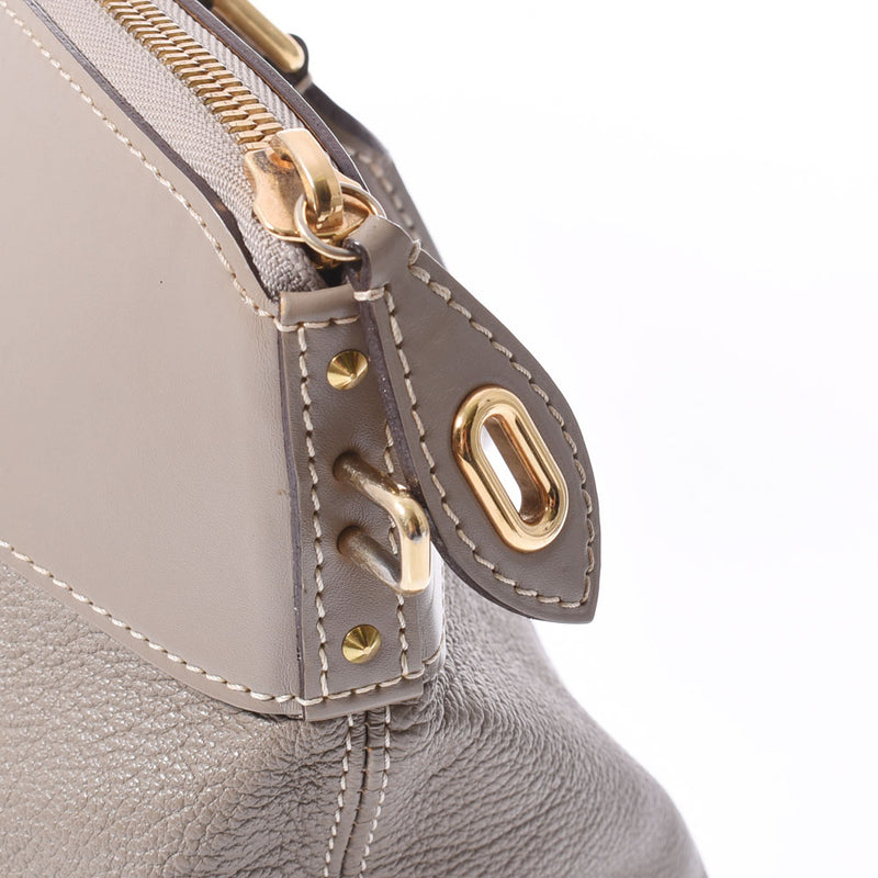 LOUIS VUITTON ルイヴィトン スハリ ロックイットMM グレー ゴールド金具 M91791 レディース レザー ハンドバッグ ABランク 中古 銀蔵