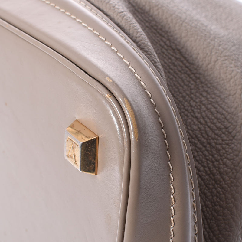 LOUIS VUITTON ルイヴィトン スハリ ロックイットMM グレー ゴールド金具 M91791 レディース レザー ハンドバッグ ABランク 中古 銀蔵