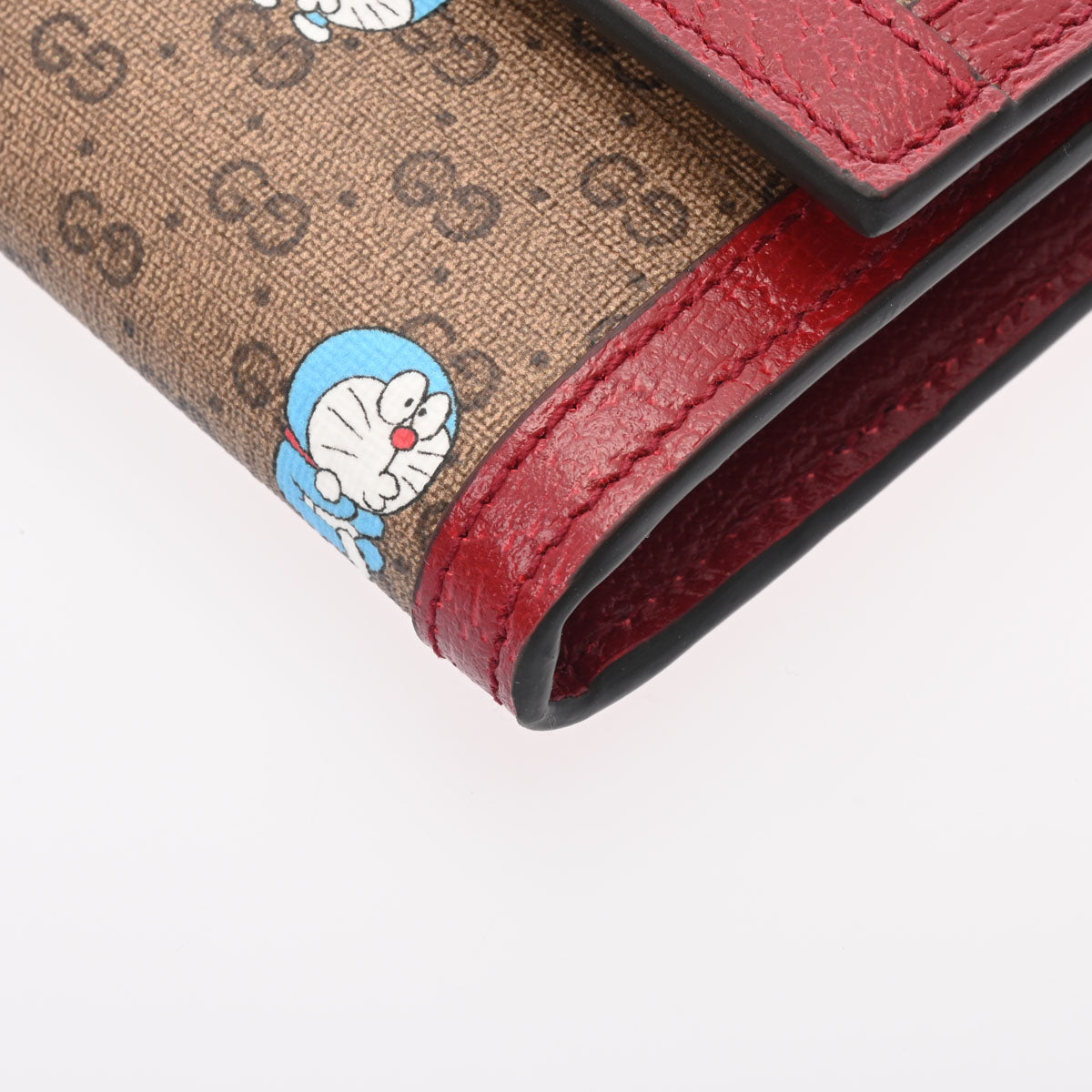 グッチドラえもんコラボ ベージュ/レッド ゴールド金具 レディース GGスプリームキャンバス 長財布 647786 GUCCI – 銀蔵オンライン