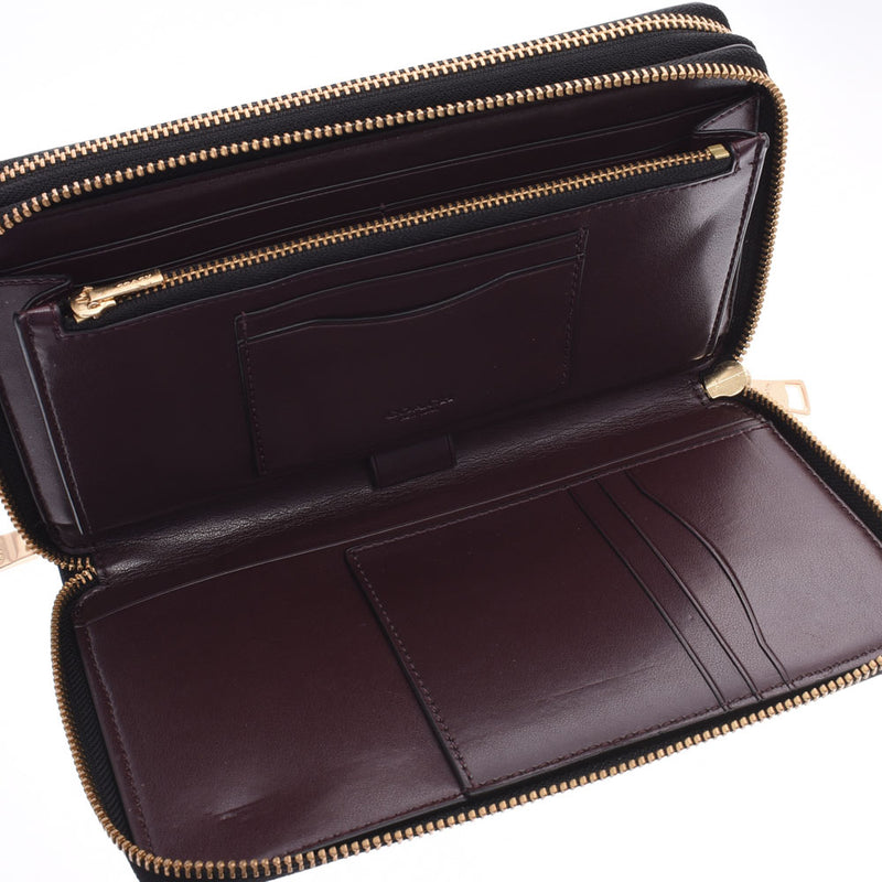 COACH coach black Bordeaux unisex leather travel case L1744 is used