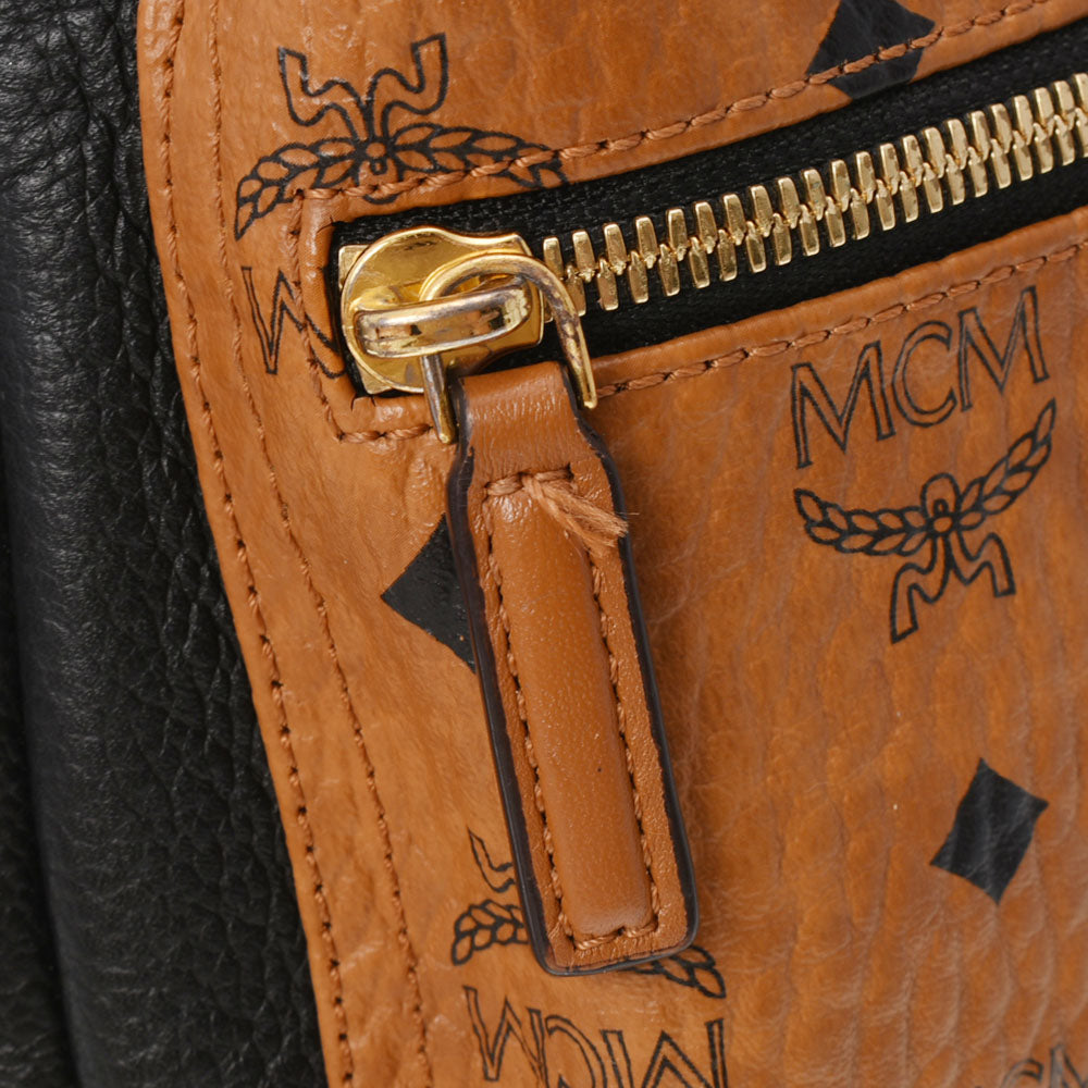 エムシーエムバックパックミニ スタッズ コニャック/ブラック