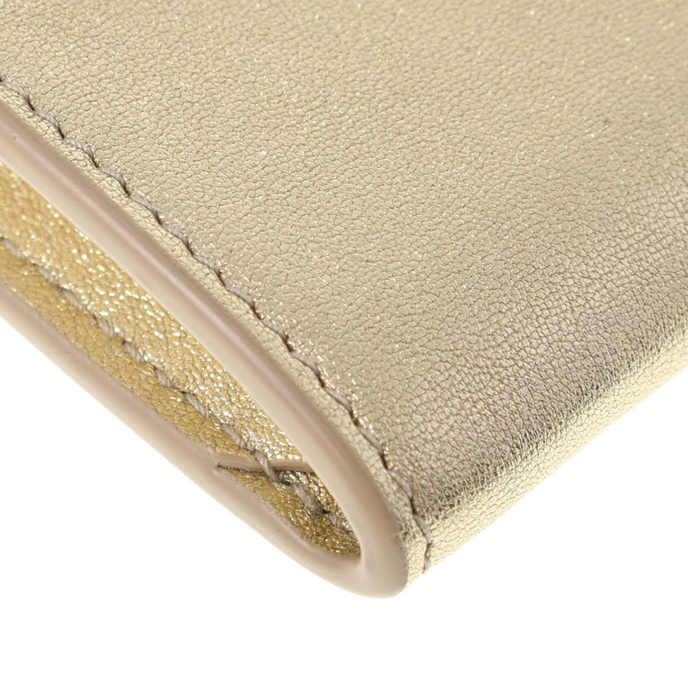 サンローランモノグラムスモール エンベロープウォレット ゴールド