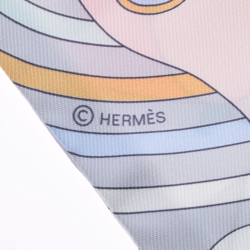 HERMES エルメス ツイリー CARRES VOLANTS 女性モチーフ グリスパール/ローズペール 063849S レディース シルク100％ スカーフ 新品 銀蔵