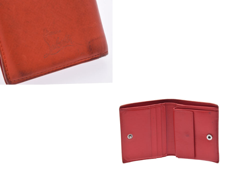 中古 ルブタン 二つ折り財布 コンパクト レザー オレンジ スタッズ