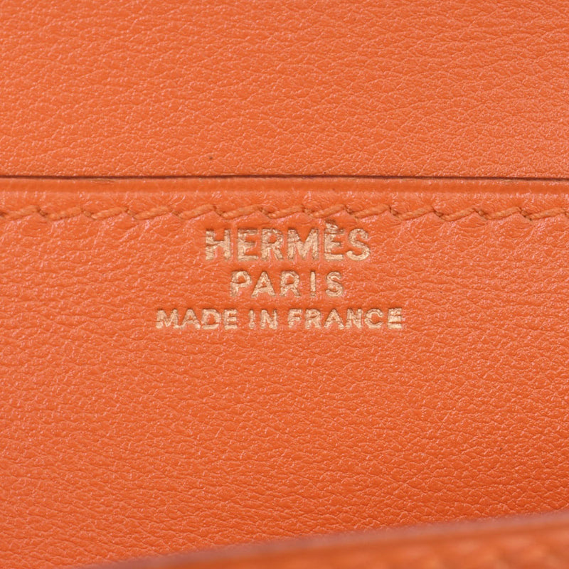 HERMES エルメスベアン 旧型 
 オレンジ系 ゴールド金具 □C刻印(1999年頃)刻印 ユニセックス ヴォーガリバー 長財布
 
 中古