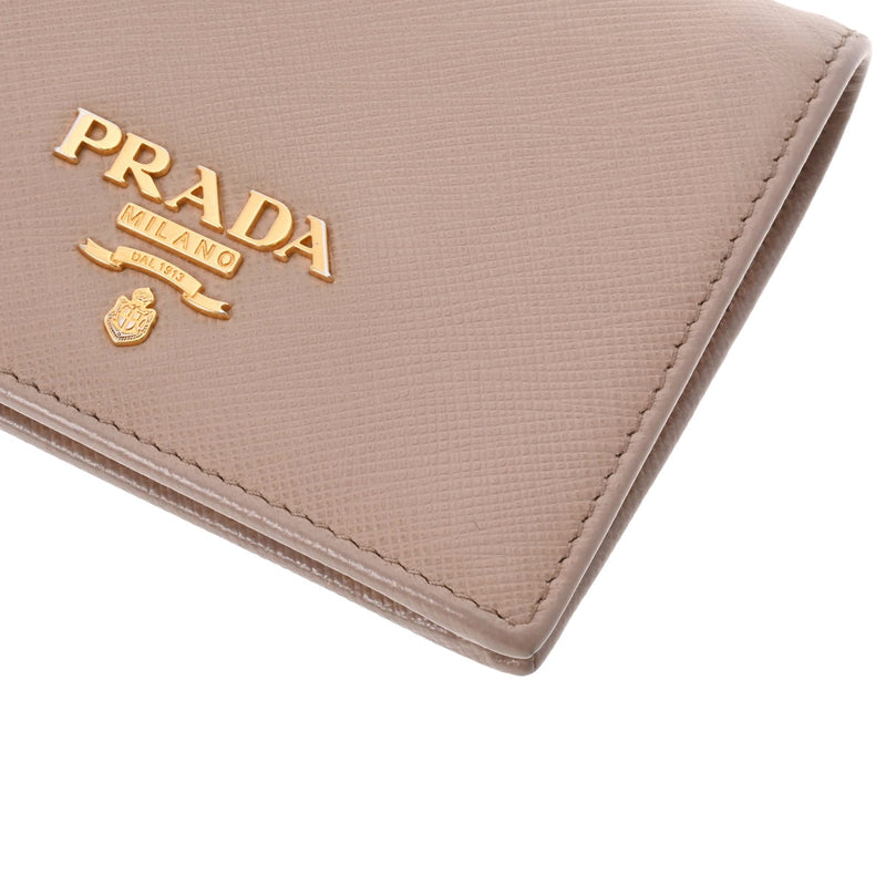 PRADA プラダ ピンク/白 ゴールド金具 レディース サフィアーノ 二つ折り財布 Bランク 中古 銀蔵