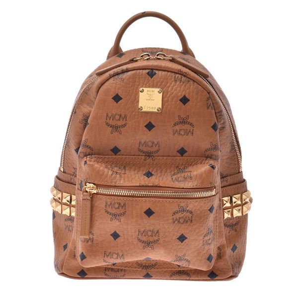 MCM em seam backpack mini side studded cognac / gold studded ladies backpack daypack used