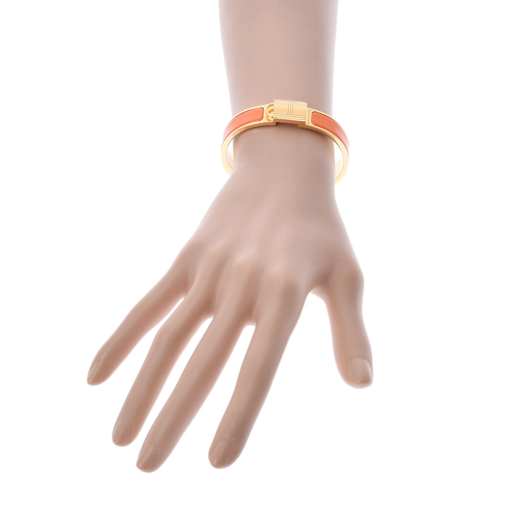 エルメス　クリックカデナ エルメスクリック カデナ オレンジ レディース ブレスレット HERMES