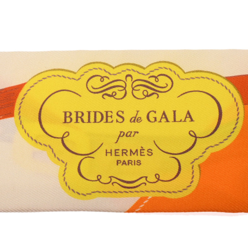 HERMES エルメス ツイリー BRIDES de GALA APPLIQUE PIQUE クリーム/オレンジ/ジョーヌヴィフ レディース シルク100％ スカーフ 新品 銀蔵